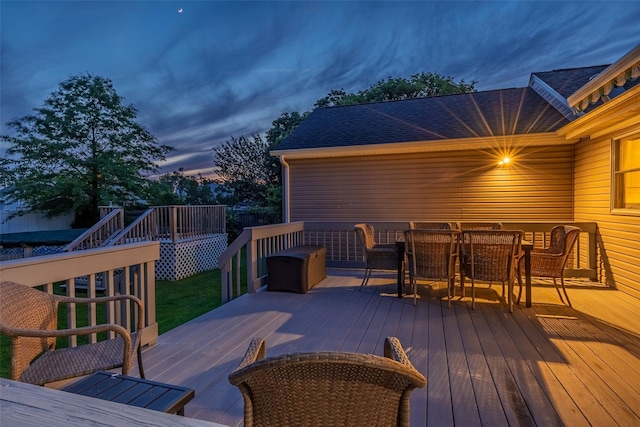 10 Bradish Ln, Babylon, NY 11702 - wooden deck featuring outdoor dining area