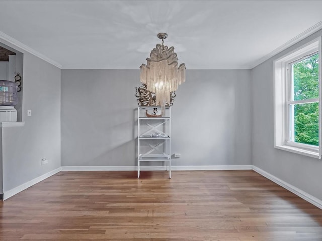 241-20 Northern Blvd Unit 6J, Little Neck, NY 11362 - unfurnished dining area featuring a chandelier, wood finished floors, and ornamental molding
