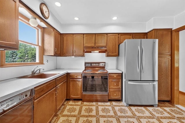 169 Rte 118, Yorktown Heights, NY 10598 - kitchen featuring stainless steel appliances, under cabinet range hood, brown cabinetry, light countertops, and recessed lighting