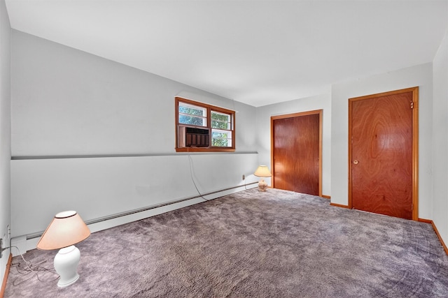 169 Rte 118, Yorktown Heights, NY 10598 - unfurnished bedroom featuring a baseboard radiator, cooling unit, and carpet floors