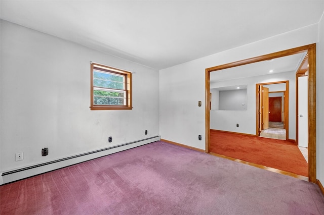 169 Rte 118, Yorktown Heights, NY 10598 - spare room with a baseboard heating unit and carpet flooring