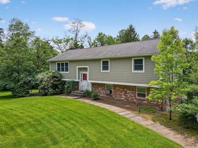 169 Rte 118, Yorktown Heights, NY 10598 - split foyer home with a front yard, a chimney, and brick siding