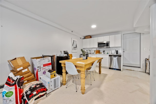 1180 Grant Ave, Bronx, NY 10456 - dining room featuring recessed lighting