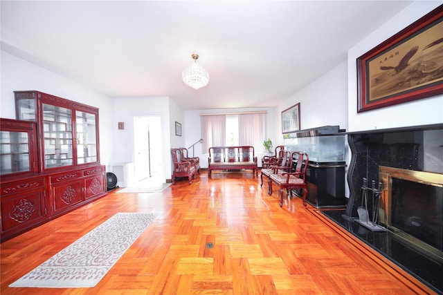 95-15 243rd St, Floral Park, NY 11001 - foyer entrance featuring a tile fireplace and a chandelier