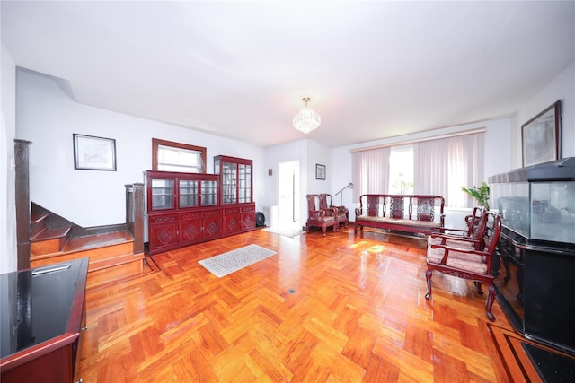 95-15 243rd St, Floral Park, NY 11001 - living room with a chandelier