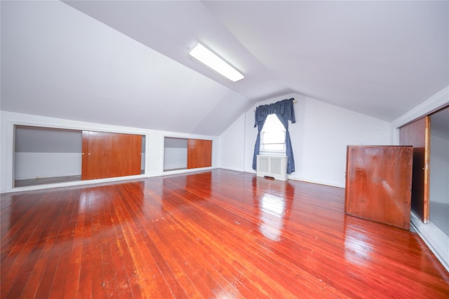 95-15 243rd St, Floral Park, NY 11001 - bonus room featuring wood-type flooring and lofted ceiling