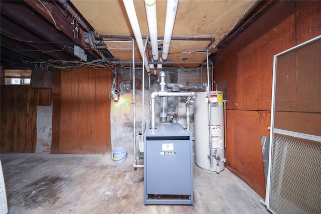 95-15 243rd St, Floral Park, NY 11001 - unfinished basement featuring gas water heater and a heating unit