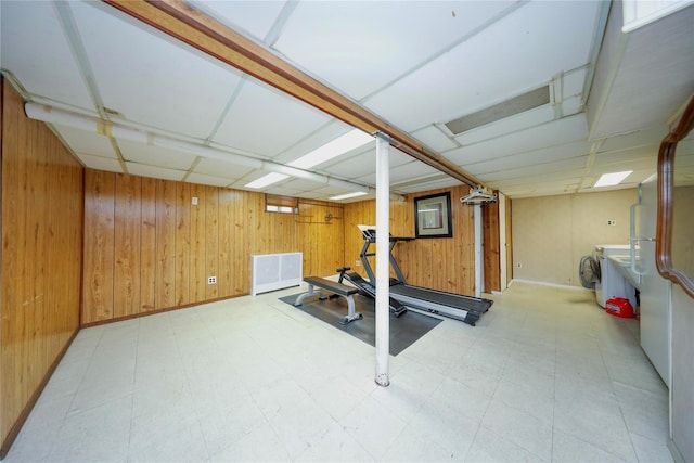 95-15 243rd St, Floral Park, NY 11001 - workout room featuring wood walls, tile patterned floors, washer / dryer, baseboards, and a drop ceiling
