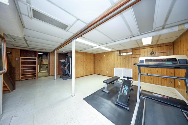 95-15 243rd St, Floral Park, NY 11001 - workout area featuring wooden walls and tile patterned floors