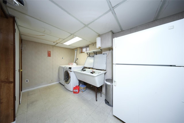 95-15 243rd St, Floral Park, NY 11001 - laundry area with washer and dryer and light floors