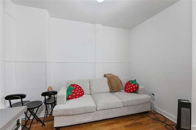 1037 College Ave, Bronx, NY 10456 - living room featuring wood finished floors and baseboards