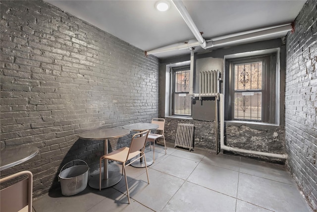 1037 College Ave, Bronx, NY 10456 - view of patio featuring outdoor dining area and radiator heating unit