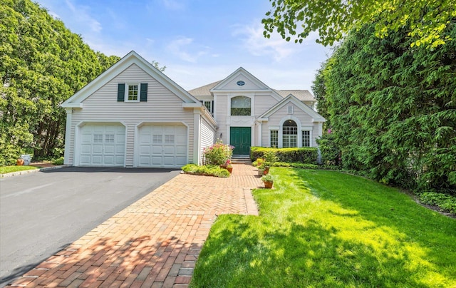 5 Hickory Ct, Manhasset, NY 11030 - view of front of house featuring driveway and a front yard