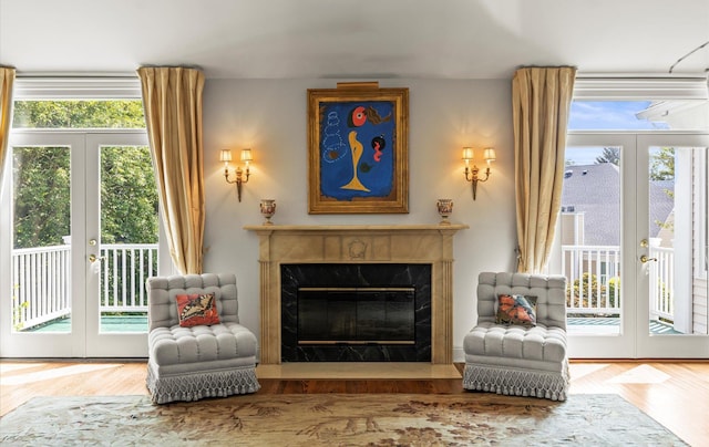 5 Hickory Ct, Manhasset, NY 11030 - living area with french doors, healthy amount of natural light, and wood finished floors
