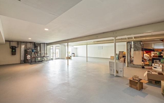 5 Hickory Ct, Manhasset, NY 11030 - basement with a central vacuum unit, water heater, and recessed lighting