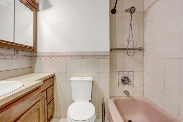1327 E 84th St, Brooklyn, NY 11236 - full bath featuring vanity, toilet, tile walls, shower / washtub combination, and a wainscoted wall