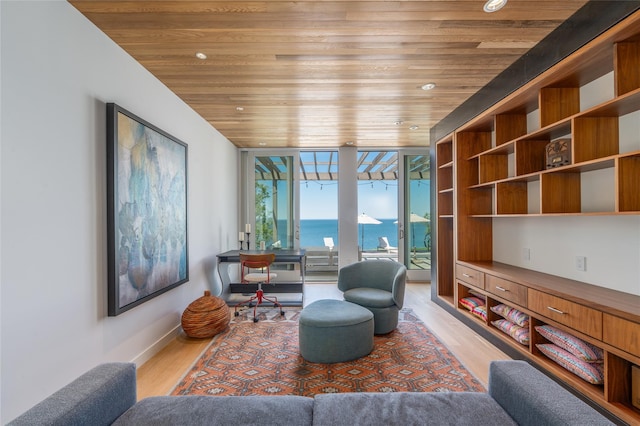 470 Lloyds Ln, Mattituck, NY 11952 - living area featuring wooden ceiling, wood finished floors, a water view, and recessed lighting