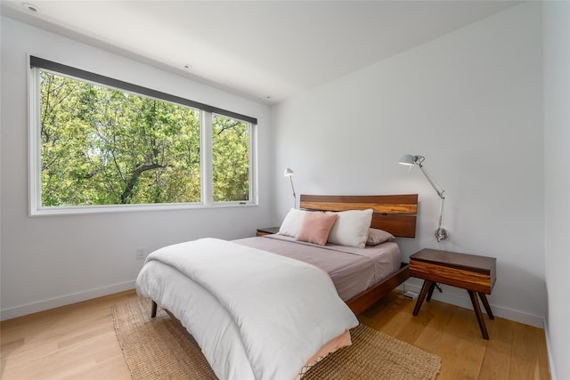 470 Lloyds Ln, Mattituck, NY 11952 - bedroom with light wood-style floors and baseboards