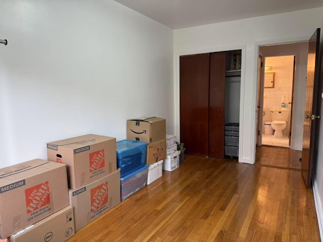 51-21 Goldsmith St, Elmhurst, NY 11373 - unfurnished bedroom featuring wood finished floors and a closet