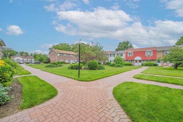 42 Springwood Dr, North Babylon, NY 11703 - view of property's community featuring a residential view and a lawn