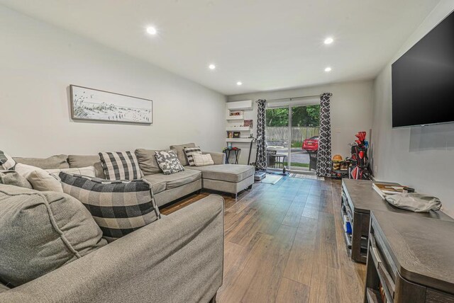 42 Springwood Dr, North Babylon, NY 11703 - living room with recessed lighting and hardwood / wood-style flooring
