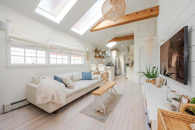 96 Alabama St, Long Beach, NY 11561 - living area with a skylight, baseboard heating, and light wood finished floors
