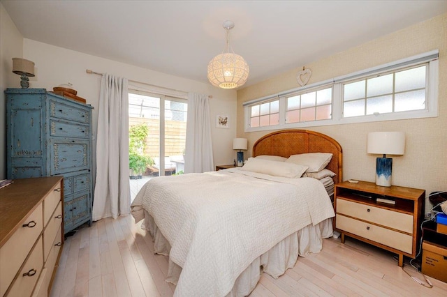 96 Alabama St, Long Beach, NY 11561 - bedroom with access to exterior and light wood-style floors