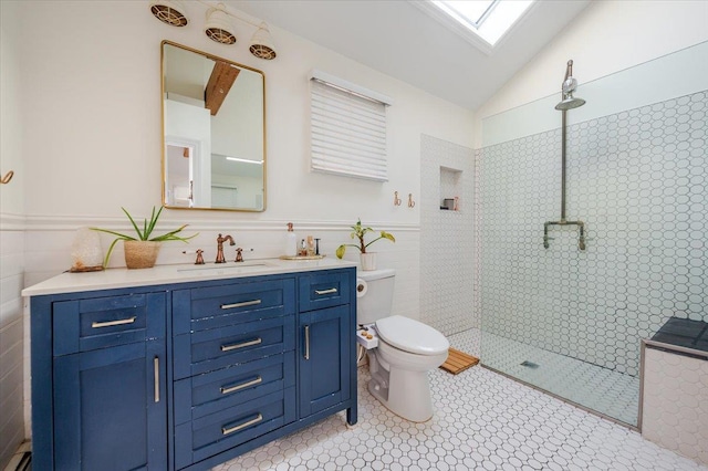 96 Alabama St, Long Beach, NY 11561 - bathroom with vanity, toilet, a skylight, tiled shower, and vaulted ceiling