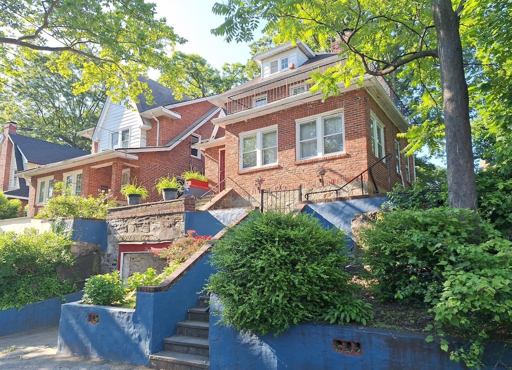 26 Amsterdam Pl, Mount Vernon, NY 10553 - view of front facade featuring brick siding