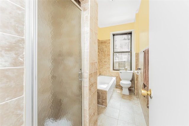 2187 Holland Ave Unit 2J, Bronx, NY 10462 - full bath with tile walls, a bath, a shower stall, and tile patterned flooring