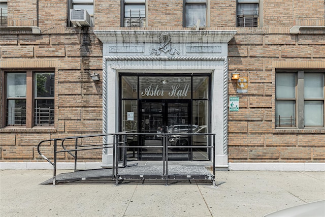 2187 Holland Ave Unit 2J, Bronx, NY 10462 - entrance to property featuring brick siding and cooling unit