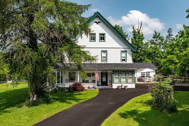 482 Scotchtown Ave, Middletown, NY 10941 - victorian home featuring a porch and a front lawn