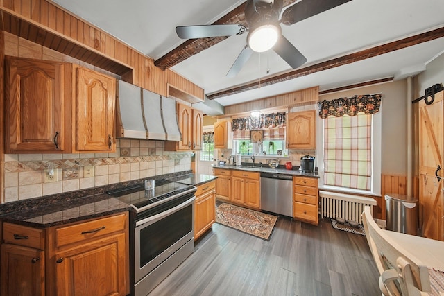 482 Scotchtown Ave, Middletown, NY 10941 - kitchen with stainless steel appliances, ventilation hood, radiator heating unit, dark wood-style flooring, and beam ceiling