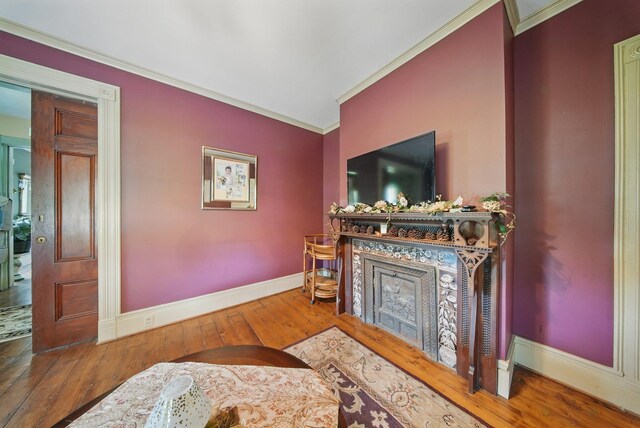 482 Scotchtown Ave, Middletown, NY 10941 - living room featuring ornamental molding, a fireplace, and wood-type flooring