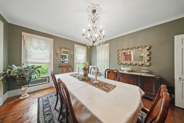 482 Scotchtown Ave, Middletown, NY 10941 - dining space with a chandelier, ornamental molding, and wood-type flooring