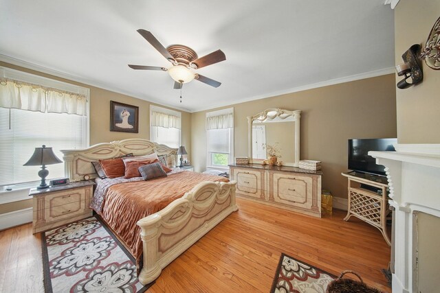 482 Scotchtown Ave, Middletown, NY 10941 - bedroom with crown molding, light wood-style floors, and ceiling fan