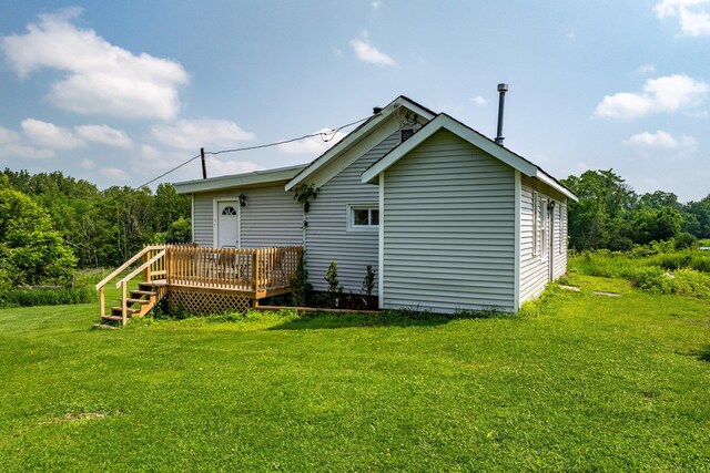 482 Scotchtown Ave, Middletown, NY 10941 - back of property with a deck and a lawn
