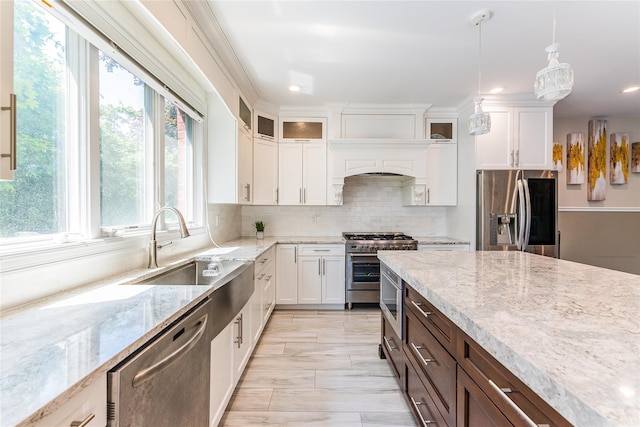 151 Birch Dr, Manhasset Hills, NY 11040 - kitchen featuring appliances with stainless steel finishes, dark brown cabinetry, white cabinets, recessed lighting, and glass insert cabinets