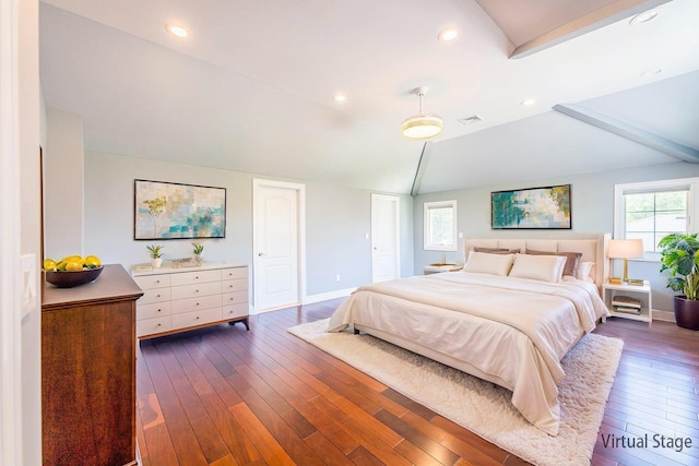 151 Birch Dr, Manhasset Hills, NY 11040 - bedroom featuring vaulted ceiling, dark wood-style floors, two closets, and recessed lighting