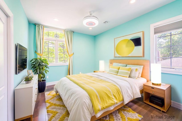 151 Birch Dr, Manhasset Hills, NY 11040 - bedroom with wood finished floors and recessed lighting