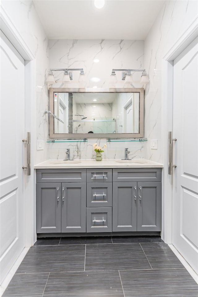 151 Birch Dr, Manhasset Hills, NY 11040 - bathroom with double vanity and a marble finish shower