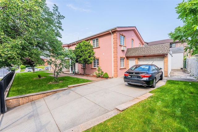 145-04 21st Ave, Whitestone, NY 11357 - view of building exterior with driveway and a garage