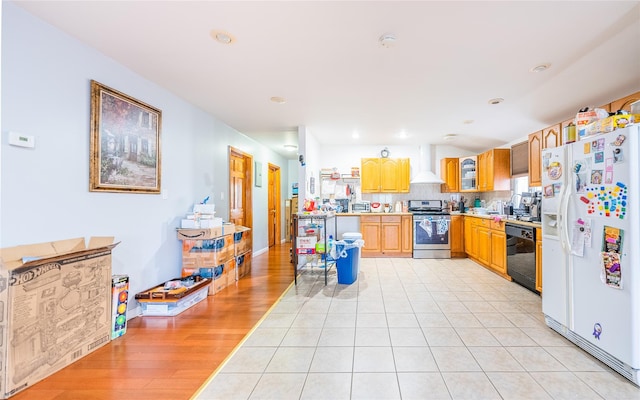 145-04 21st Ave, Whitestone, NY 11357 - kitchen with stainless steel stove, white refrigerator with ice dispenser, black dishwasher, wall chimney exhaust hood, and light countertops