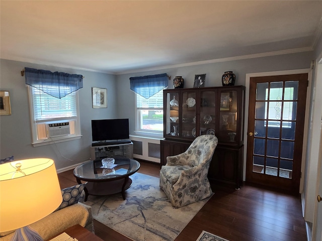 29 Irving St, Valley Stream, NY 11580 - living room with radiator, wood finished floors, cooling unit, and crown molding