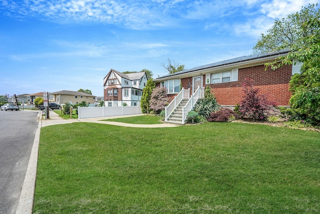 123 Baker Ct, Island Park, NY 11558 - view of front of house featuring brick siding and a residential view