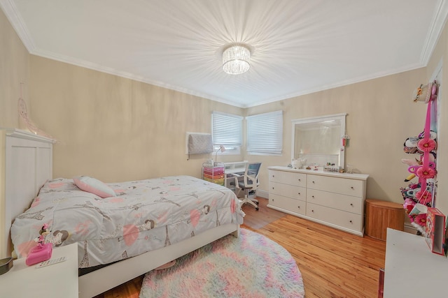 123 Baker Ct, Island Park, NY 11558 - bedroom with ornamental molding and light wood-type flooring