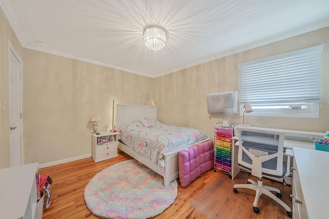 123 Baker Ct, Island Park, NY 11558 - bedroom with a chandelier, light wood-type flooring, ornamental molding, and an office area