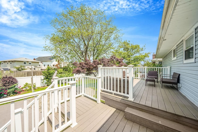 123 Baker Ct, Island Park, NY 11558 - wooden deck with a residential view