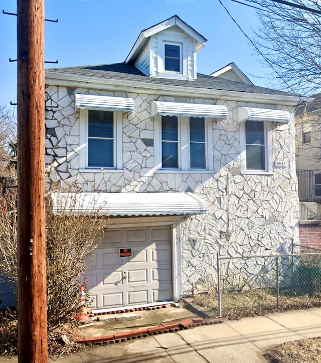 4439 Mundy Ln, Bronx, NY 10466 - view of front of house with stone siding and a shingled roof