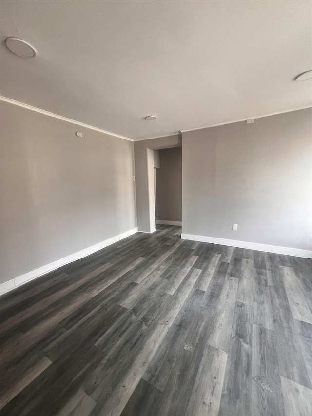 27 Hooker Ave, Poughkeepsie, NY 12601 - empty room featuring dark wood finished floors and baseboards